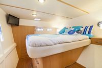 Master suite island bed on starboard.